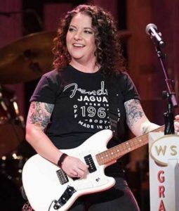 Ashley Mcbryde playing electric guitar